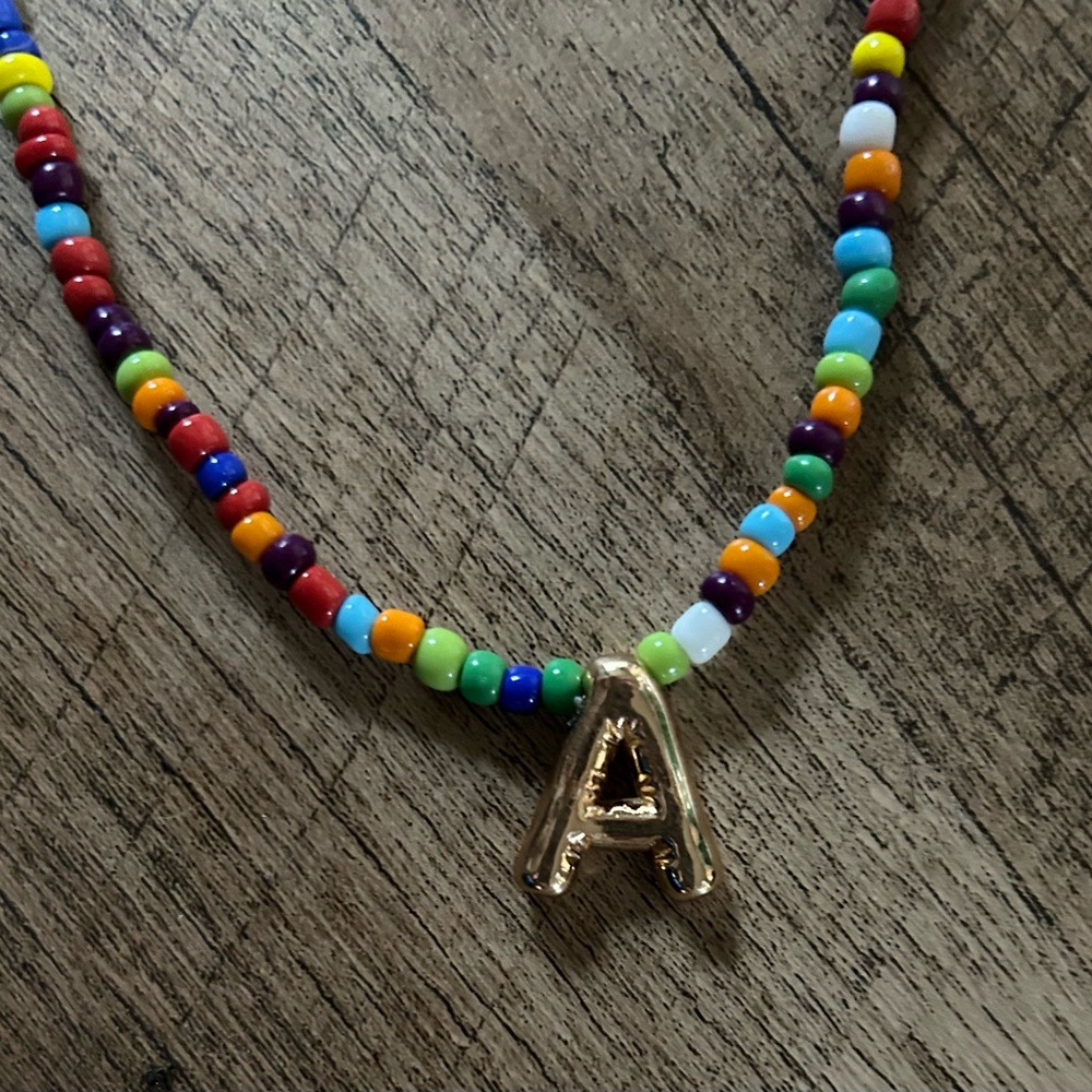 Multicolor Beaded Necklace w/ Gold Tone A Pendant
Bubble Letter initial necklace